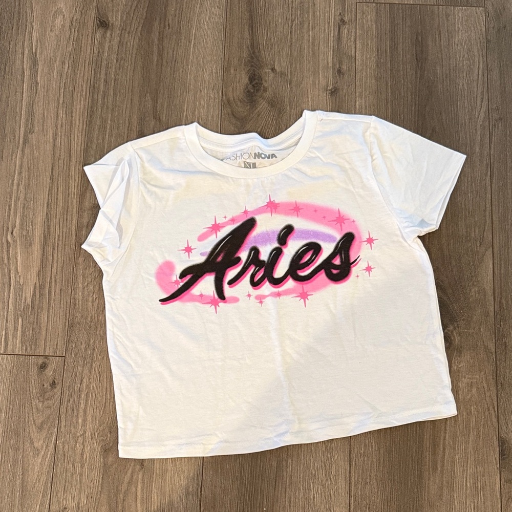 Fashion Nova  White Tee with Pink and Black 'Aries' Graphic